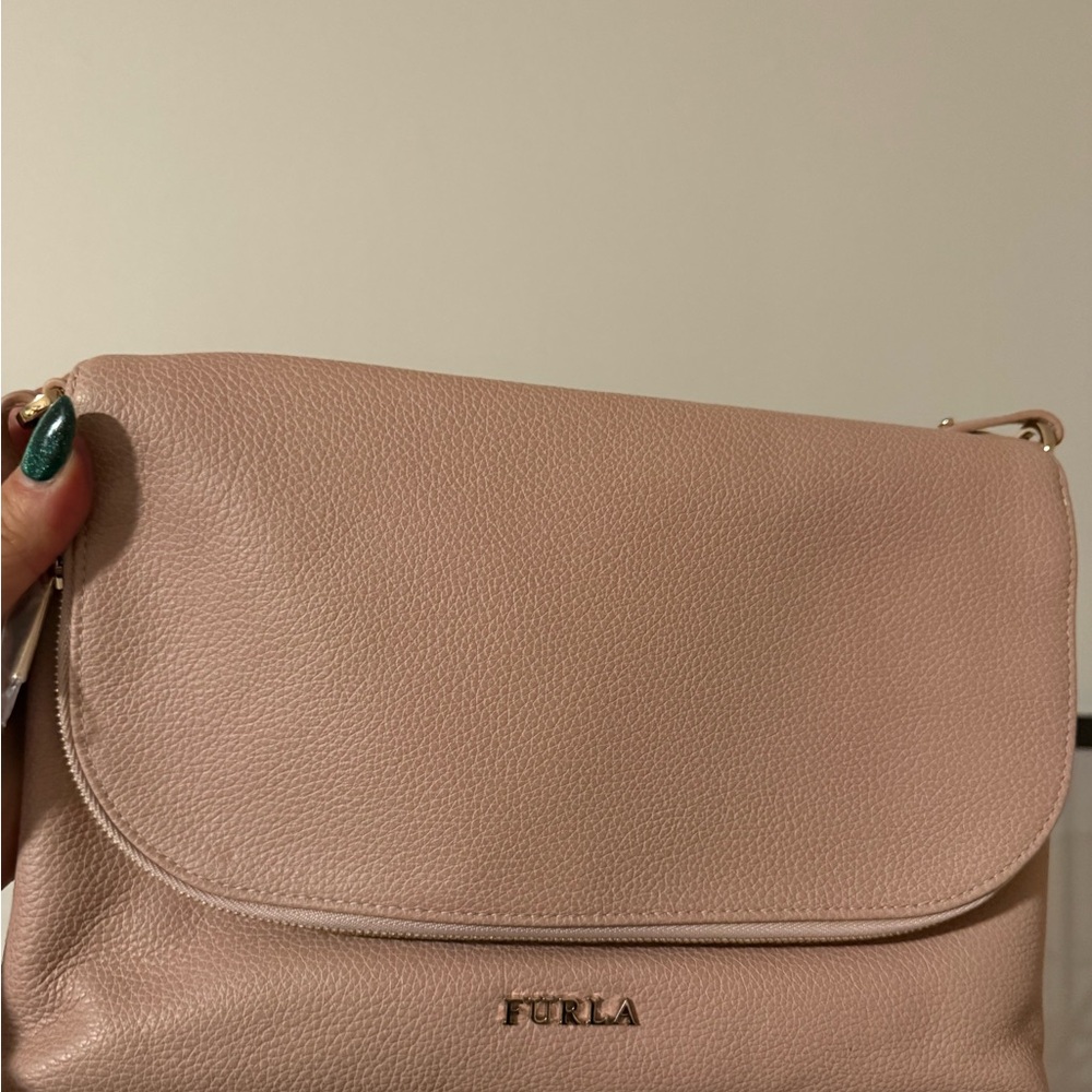 Furla Pink Leather Crossbody Bag 7x11 inches
Brand new plastic still on hardware